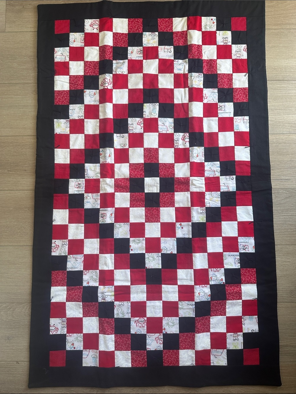 Handmade Red, Black & White Checkered Quilt with Floral Accents